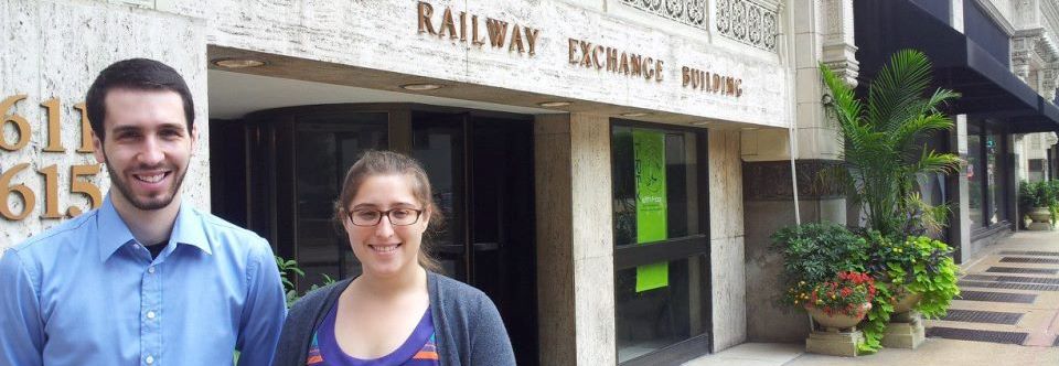 Portrait of co-founders Brimer (left) and Cohen outside of the Railway Exchange Building